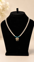Pearl & Turquoise Bow Pendant Necklace - View 1 - Shop Aizel