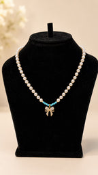 Pearl & Turquoise Bow Pendant Necklace - View 1 - Shop Aizel