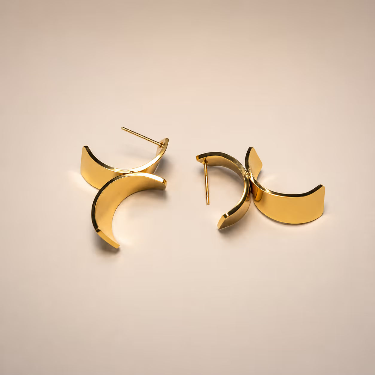 Gold Geometric Curved Stud Earrings - View 1 - Shop Aizel