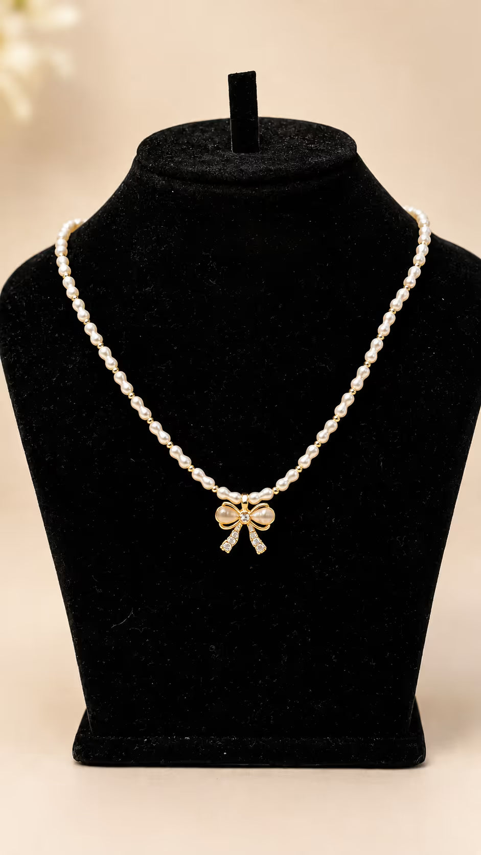 Pearl Bow Pendant Necklace - View 1 - Shop Aizel