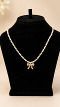 Pearl Bow Pendant Necklace - View 1 - Shop Aizel