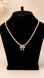 Pearl Bow Pendant Necklace - View 1 - Shop Aizel